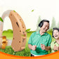 Beige behind-the-ear hearing aid device with clear tube and gold control ring