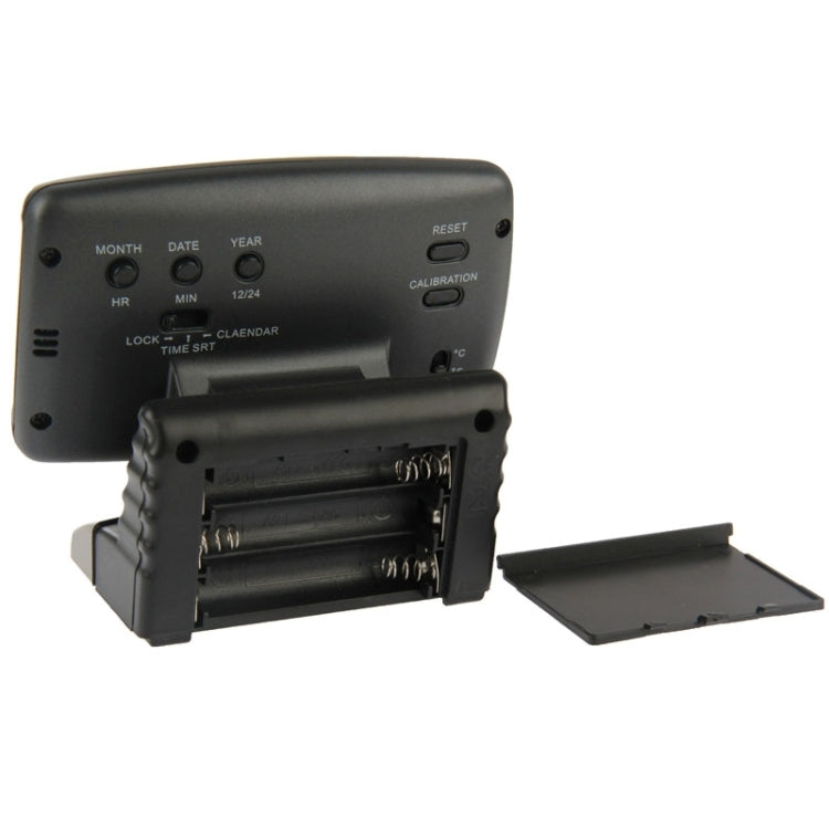 3.5-inch LCD digital car compass back with open battery compartment and mounting stand