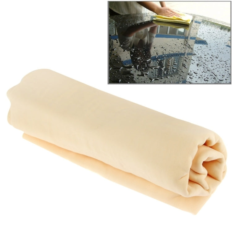 Car wash chamois towel, light beige folded, visible plush texture and rolled edge