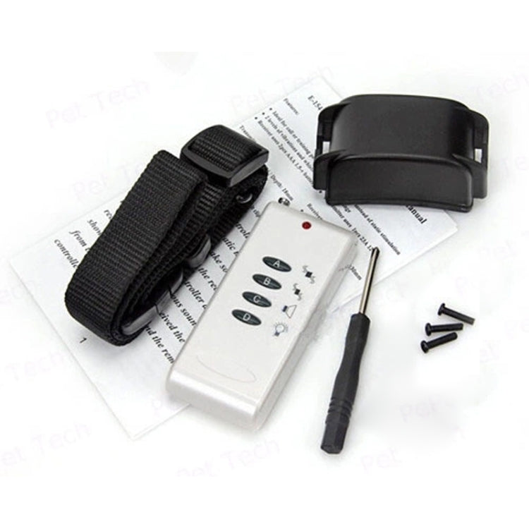 Dog training remote kit with white handset, black strap, receiver, and accessories