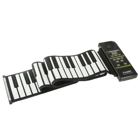 Roll-up MIDI piano with 88 keys and black control module, laid out on white