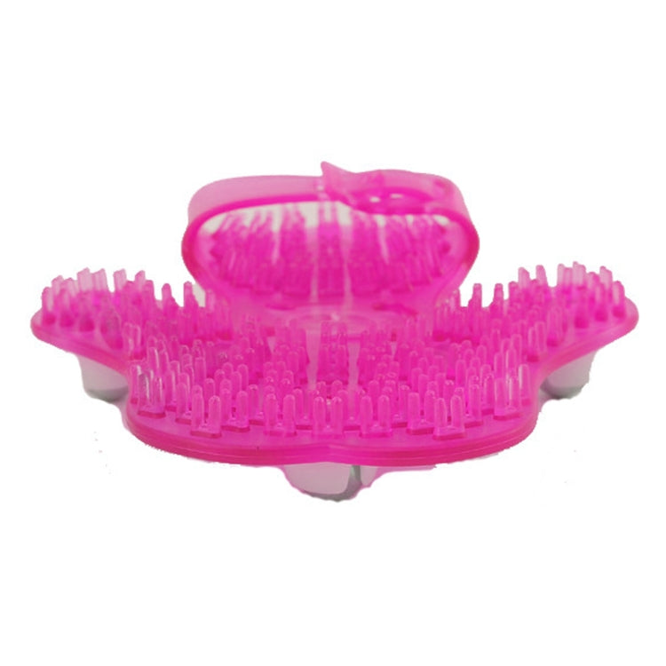 Magenta palm massager with spiked underside and raised feet