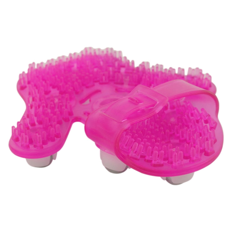 Magenta handheld palm massager side view with silver balls and spiky textured surface