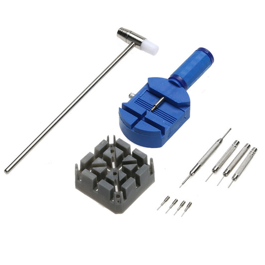 Watch repair tools set with blue press tool, metal pin, and screwdriver bits