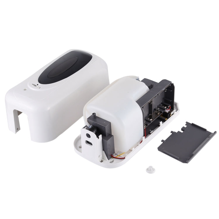 Touchless liquid soap dispenser with internal components exposed and cover removed