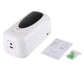 White touchless liquid soap dispenser with included paper manual and small accessory items