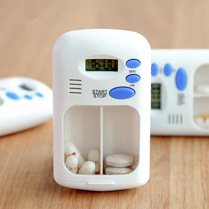Smart pill reminder timer box with digital screen and blue start/stop buttons