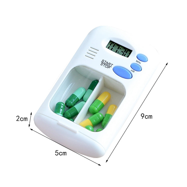 Smart pill reminder timer box open to show colorful capsule slots and LCD display