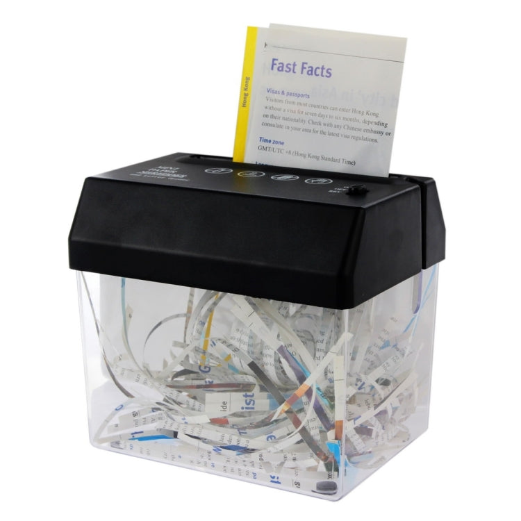 Mini paper shredder with letter opener and clear waste bin filled with cut-up paper