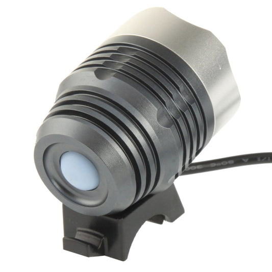 Side view of silver bicycle headlamp light with black cooling fins and mounting bracket