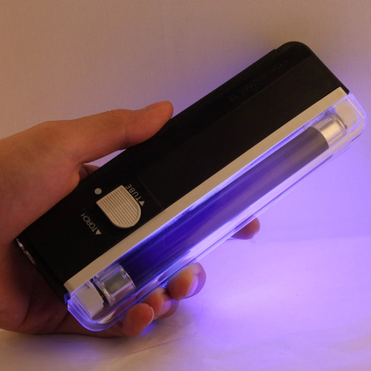 Handheld UV security blacklight with clear cover and circular power controls