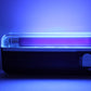 Close-up of handheld UV blacklight with bright illuminated light strip