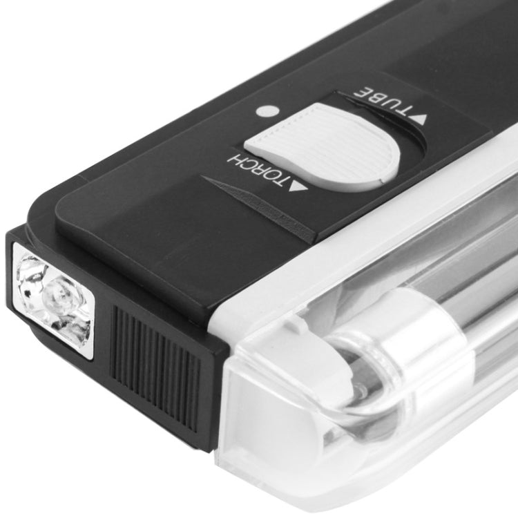 Handheld UV blacklight with black panel, circular sensor, and front light window