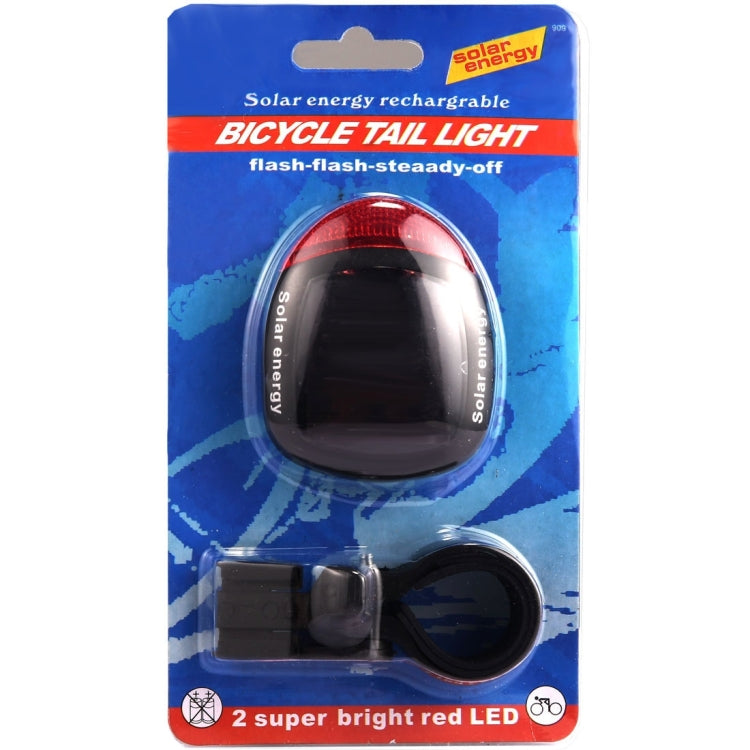 Solar bicycle tail light blister pack with red LED tail light