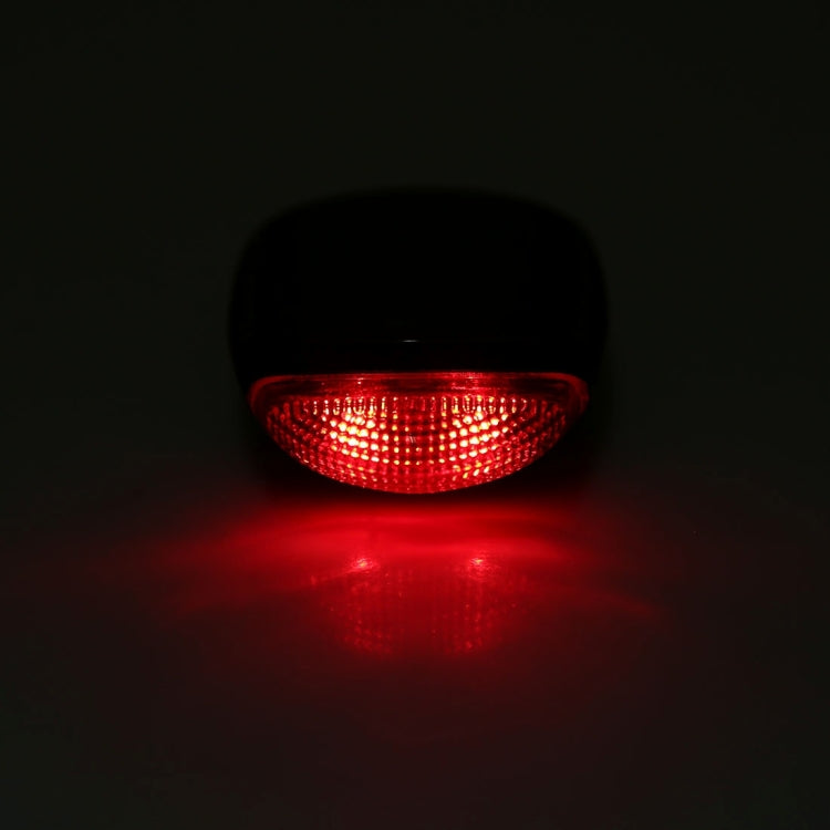Illuminated solar bicycle tail light with bright red glow