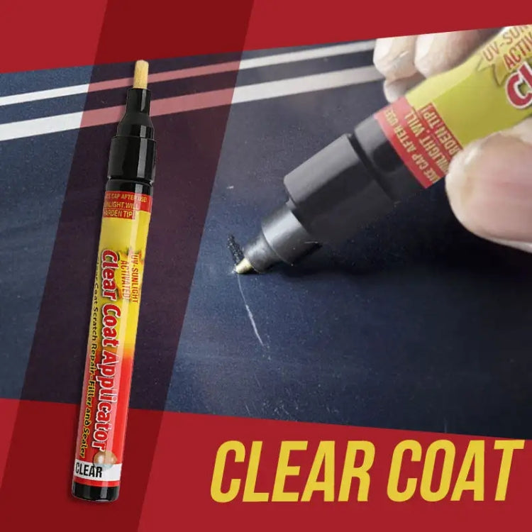 Clear coat scratch repair pen with applicator tip applying product to a car panel