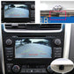 Car rear view camera mounted on rear trim above the license plate area