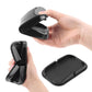 Universal smartphone holder with adjustable arms and textured insert, shown in use
