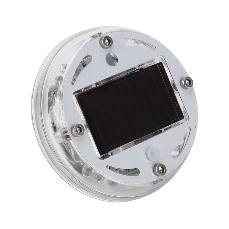 Round solar wheel LED light with clear housing and black solar panel