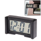 Digital LCD car clock display showing blue time digits on a black rectangular case