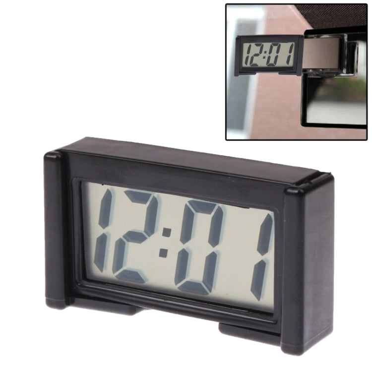 Digital LCD car clock display showing blue time digits on a black rectangular case