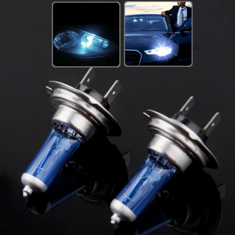 Pair of halogen headlight bulbs with blue glass tubes and metal mounting pins