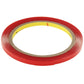 Red double-sided adhesive tape roll with inner clear backing liner