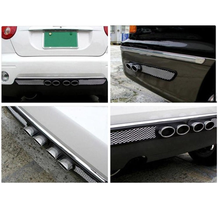 Black exhaust pipe decal on car bumper with chrome rings and mesh trim panel