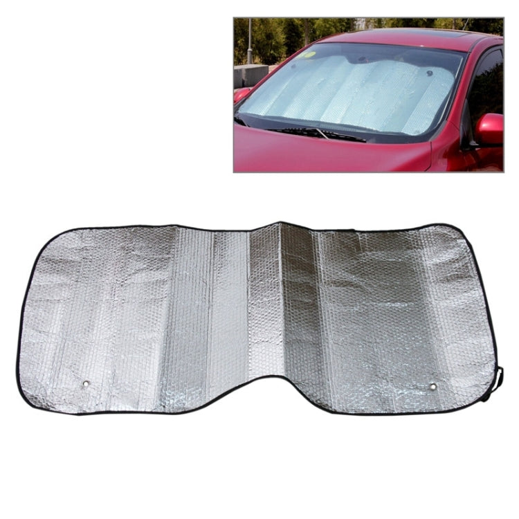 Foldable rear windshield sunshade in silver foil with black edge trim