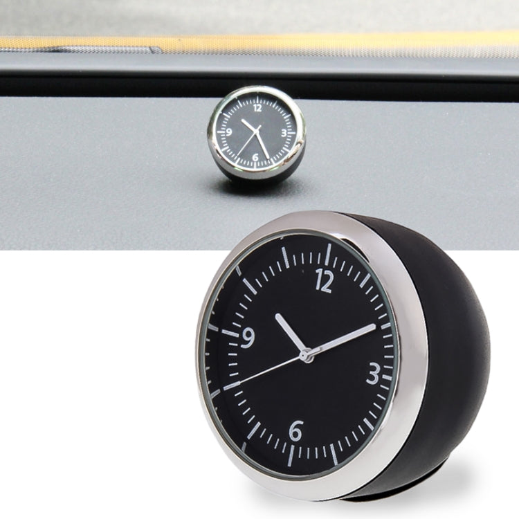 Round mini dashboard clock with black face, silver rim, and white hour markers