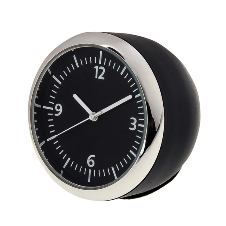 Angled round mini dashboard clock with black face and silver bezel