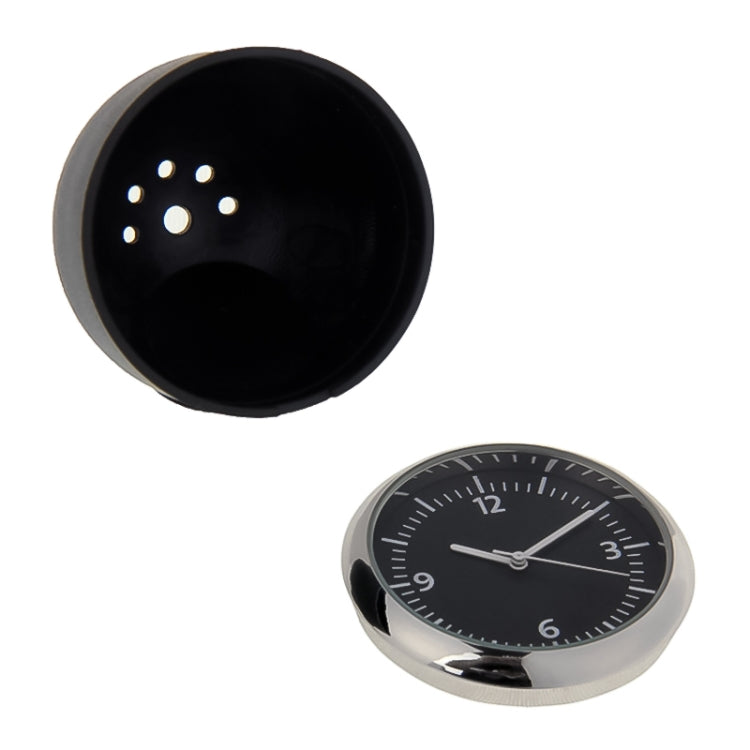 Mini dashboard clock showing open back with mounting holes and black face