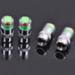 Set of four chrome tire valve caps with green-and-red pressure indicator tips.