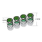 Four small chrome tire valve caps with green pressure indicator tops.