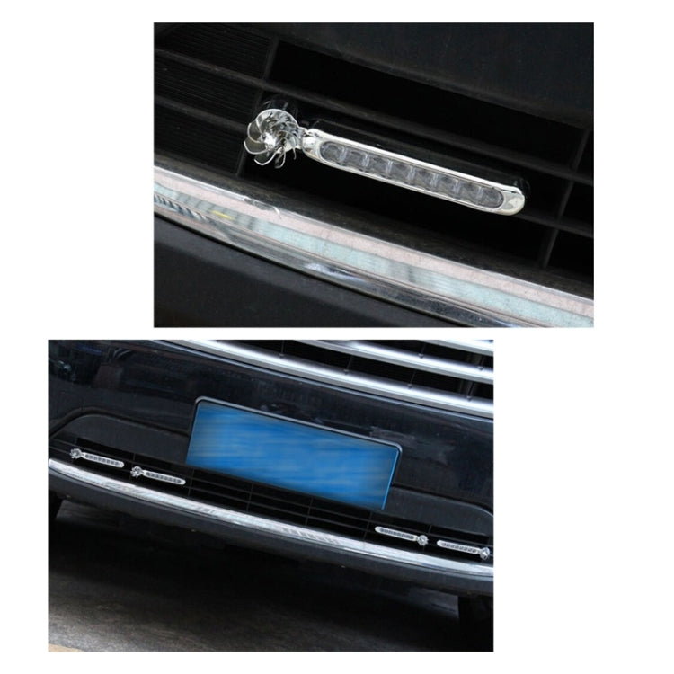 Chrome 8-LED wind powered car light bars installed on a vehicle grille