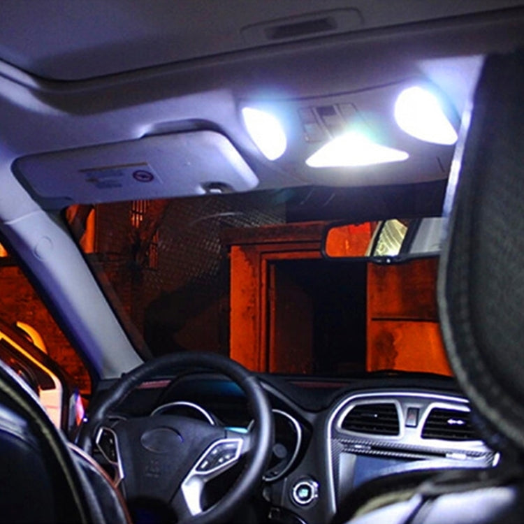 Car dashboard reading lights lit with bright white glow