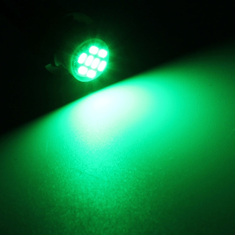 Green LED T10 car signal bulb glowing with bright LED array