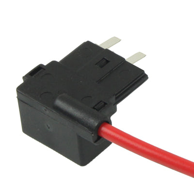 Black fuse tap holder with red wire connection and metal blade pins