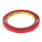 Double-sided adhesive tape roll, red translucent tape wound around brown core