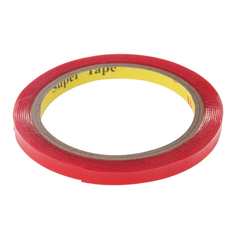 Double-sided adhesive tape roll, red translucent tape wound around brown core