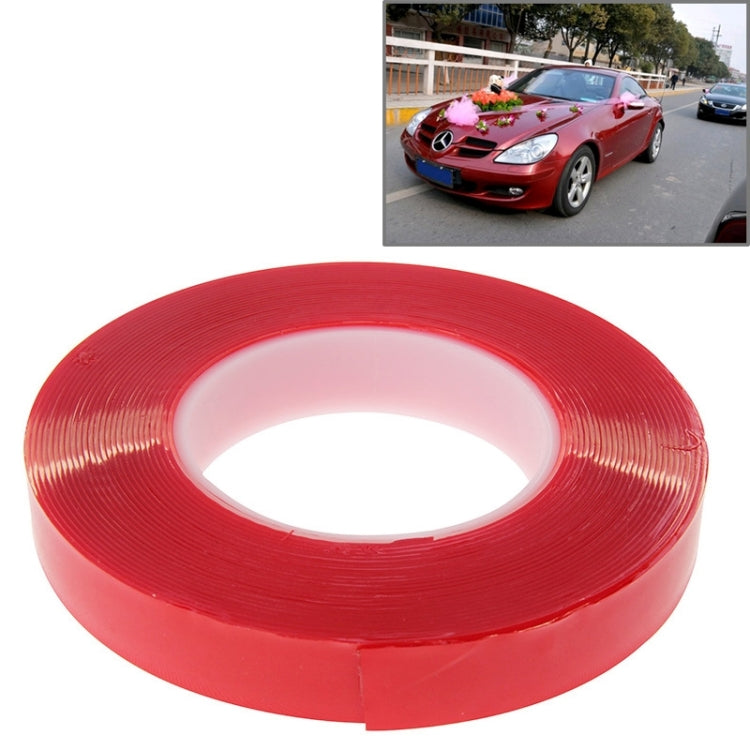 Red double-sided adhesive tape roll with clear inner backing