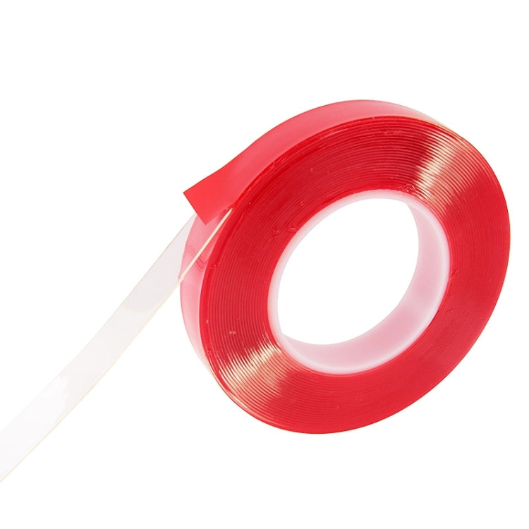 Red double-sided adhesive tape roll with tape strip extending outward