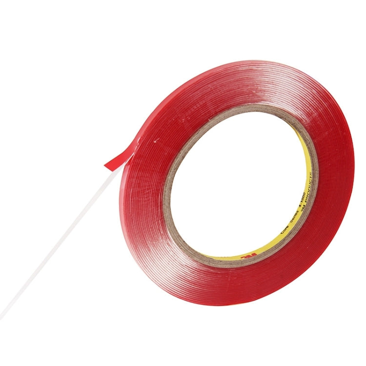 Red double-sided adhesive tape roll with loose tape end strip