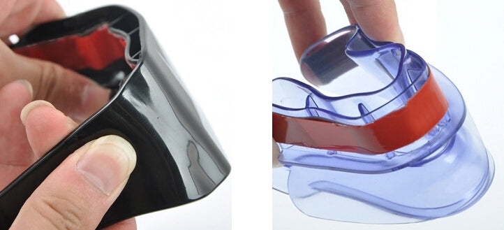 Flexible rain deflector with transparent shield, shown before and during fitting