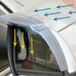 Transparent rain deflector on mirror showing airflow arrows for rain protection