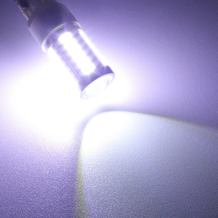 LED 1156 bulb emitting bright white light with visible beam flare