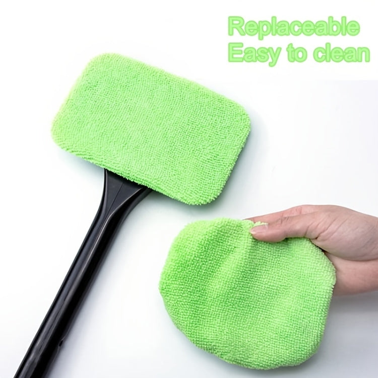 Replaceable green microfiber cleaning pads with hand holding one