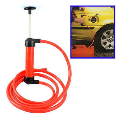Red siphon pump with connected tubing and coiled flexible hose for transfer