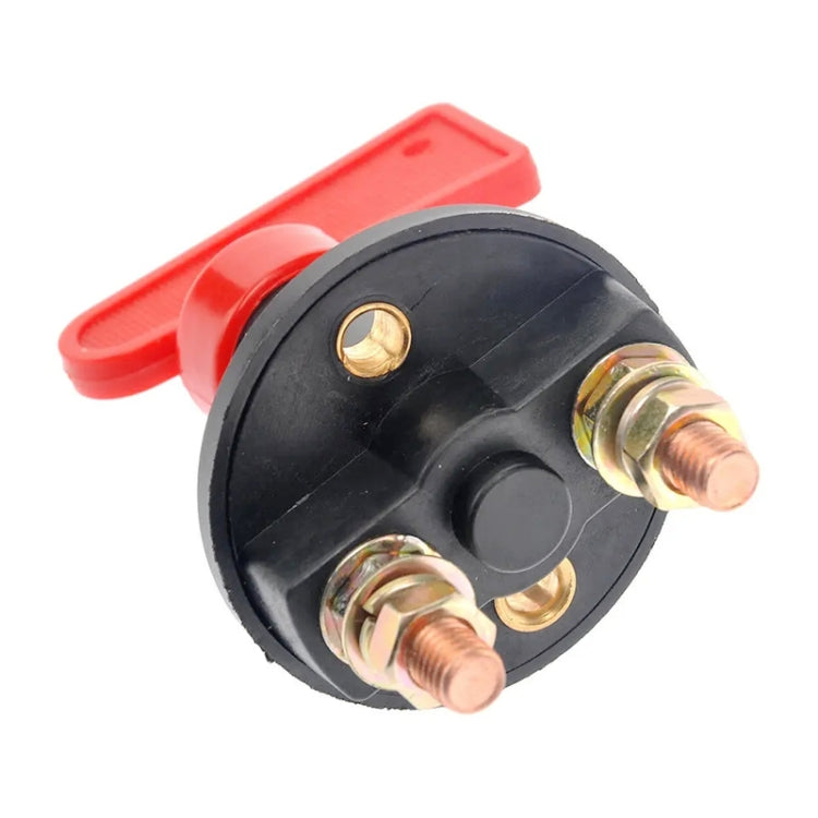 Rotating car electrical master switch with red lever and black circular body