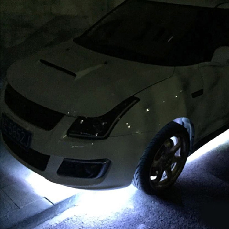 Flexible waterproof LED strip light, 90cm, white LEDs shining near wheel area